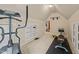 Spacious gym area with workout equipment and a separate area for weights and floor exercises at 314 Hogan Woods Cir, Chapel Hill, NC 27516