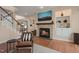 Comfortable living area with a stone fireplace, built-in shelving, and easy access to the upper floor at 314 Hogan Woods Cir, Chapel Hill, NC 27516