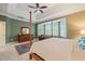 Comfortable bedroom with tray ceilings, a four-poster bed, and a bright, airy feel at 314 Hogan Woods Cir, Chapel Hill, NC 27516