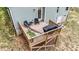 Aerial view of a deck featuring a grill and a hammock, ideal for backyard entertainment at 318 Natchez Trace, Fuquay Varina, NC 27526