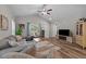 Spacious living room with vaulted ceilings, comfortable seating, and natural light at 318 Natchez Trace, Fuquay Varina, NC 27526
