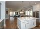 Open-concept kitchen featuring a large island and seamlessly connected to the living room at 3416 Edgemont Dr, Raleigh, NC 27612