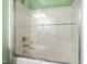 Bright bathroom featuring a shower with clear glass doors and chrome fixtures at 3428 Hardwood Dr, Apex, NC 27539