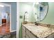 Bathroom showcasing granite countertop and vanity with sink at 3428 Hardwood Dr, Apex, NC 27539