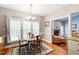 Breakfast nook featuring a round table, chairs, and large windows for natural light at 3428 Hardwood Dr, Apex, NC 27539