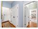Hallway with doors at 3428 Hardwood Dr, Apex, NC 27539