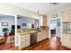 Updated kitchen with granite countertops, stainless steel appliances, and hardwood floors at 3428 Hardwood Dr, Apex, NC 27539