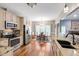 Bright kitchen featuring stainless steel appliances, granite countertops, and an eat-in area at 3428 Hardwood Dr, Apex, NC 27539