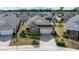 A high angle shot showing a cozy neighborhood of one-story homes with a well-maintained lawn at 37 Blue Spruce Cir, Clayton, NC 27527