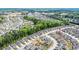 Aerial view of a neighborhood with mature trees and landscaping at 37 Blue Spruce Cir, Clayton, NC 27527