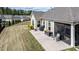 Spacious backyard with a patio and screened in porch area, perfect for outdoor entertaining at 37 Blue Spruce Cir, Clayton, NC 27527
