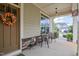 Charming front porch with seating, front door with wreath, and stone accents at 37 Blue Spruce Cir, Clayton, NC 27527