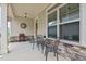 Cozy front porch with stone accents, seating, and decorative touches creating an inviting entryway at 37 Blue Spruce Cir, Clayton, NC 27527