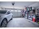 Garage featuring an automobile and ample storage shelving at 37 Blue Spruce Cir, Clayton, NC 27527