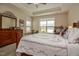 Cozy main bedroom with natural light and ceiling fan at 37 Blue Spruce Cir, Clayton, NC 27527
