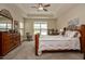 Comfortable main bedroom featuring neutral color palette and ceiling fan at 37 Blue Spruce Cir, Clayton, NC 27527