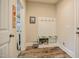 Mud room area with coat rack and storage bench at 37 Blue Spruce Cir, Clayton, NC 27527