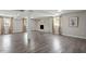 Spacious basement with decorative fireplace, gray floors, and natural lighting at 3713 Arrowwood Dr, Raleigh, NC 27604