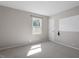 Clean bedroom with neutral carpet and walls, and lots of natural light at 3713 Arrowwood Dr, Raleigh, NC 27604