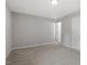 Bright bedroom featuring neutral walls and carpet, and lots of natural light at 3713 Arrowwood Dr, Raleigh, NC 27604
