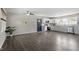 Open-concept kitchen featuring white cabinets, stainless steel appliances, and modern finishes at 3713 Arrowwood Dr, Raleigh, NC 27604