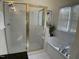 Bathroom includes tub with jets and separate shower at 409 Parkside Cir, Chapel Hill, NC 27516