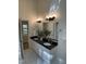 Bathroom featuring dual sinks and granite countertops at 409 Parkside Cir, Chapel Hill, NC 27516