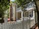 Charming home with inviting porch, decks, white picket fence and mature landscaping at 409 Parkside Cir, Chapel Hill, NC 27516