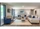 Comfortable living room with stylish furniture, a patterned rug, and decorative accents at 42 Saintsbury Dr, Fuquay Varina, NC 27526