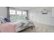 Inviting bedroom featuring a large window, plush carpeting, and neutral walls at 487 Lochalsh Dr, Gibsonville, NC 27249