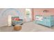 Bedroom features rainbow wall art, grey rocking chair, side table, and a teal-colored crib by a window at 487 Lochalsh Dr, Gibsonville, NC 27249