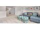 Inviting living room featuring neutral walls, plush carpeting, and comfortable seating at 487 Lochalsh Dr, Gibsonville, NC 27249