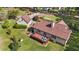 A spacious property with a cozy home featuring a deck, surrounded by mature trees and beautifully landscaped gardens at 50 Gill Ln, Fuquay Varina, NC 27526