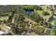 Beautiful property with treed perimeter, including a home, detached garage and a small pond at 50 Gill Ln, Fuquay Varina, NC 27526