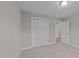Bedroom featuring neutral paint, plush carpeting, and a double closet at 50 Gill Ln, Fuquay Varina, NC 27526