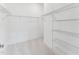 Large walk-in closet with wire shelving for optimal storage and organization at 512 Gainer Dr # 4, Raleigh, NC 27610