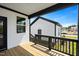 The back porch has wood floors and white walls at 528 Folk Song Way, Wendell, NC 27591