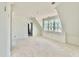 Bright attic space with white walls and trim, dormer windows at 5504 Kingwood Dr, Raleigh, NC 27609