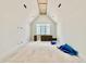 Bright attic space includes built-in cabinets and a window at 5504 Kingwood Dr, Raleigh, NC 27609