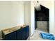 Bathroom showing blue vanity and elegant black tiled shower at 5504 Kingwood Dr, Raleigh, NC 27609