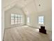 Bright bedroom with vaulted ceilings, hardwood floors and abundant natural light at 5504 Kingwood Dr, Raleigh, NC 27609