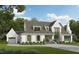 Beautiful exterior rendering of a white brick home with gray shingle roof and an attached garage at 5504 Kingwood Dr, Raleigh, NC 27609