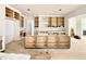 Spacious kitchen with unfinished wood cabinets, white walls, and hardwood floors being installed at 5504 Kingwood Dr, Raleigh, NC 27609