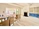 Spacious living room boasting sliding doors to outside and views of backyard construction at 5504 Kingwood Dr, Raleigh, NC 27609