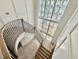 Magnificent staircase with a curved railing at 5504 Kingwood Dr, Raleigh, NC 27609
