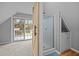 Bathroom with sliding barn door, glass shower and built-in storage space at 555 Canterwood Dr, Mebane, NC 27302