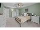 Bedroom with a ceiling fan, carpet flooring, and neutral paint at 555 Canterwood Dr, Mebane, NC 27302