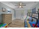 Spacious bedroom featuring hardwood floors, a bunk bed, and ample storage at 555 Canterwood Dr, Mebane, NC 27302