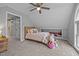 Bedroom features natural light, plush pillows, and built-in storage at 555 Canterwood Dr, Mebane, NC 27302