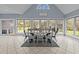Bright dining room with a large table, vaulted ceilings and lots of natural light at 555 Canterwood Dr, Mebane, NC 27302